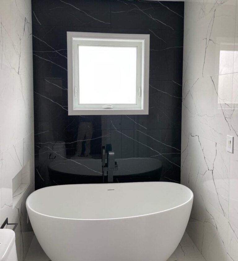 a stylish sink and mirror above